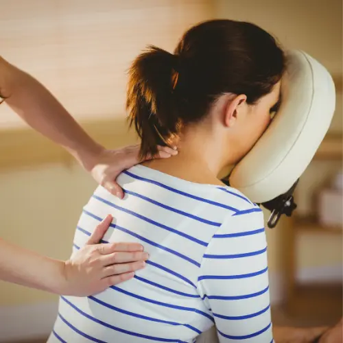 Woman getting a seated massage