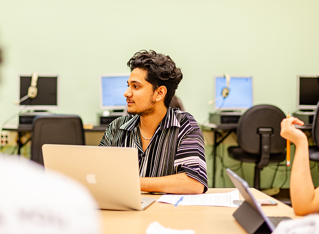 Student working at laptop