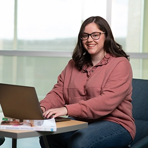 Student working at home on laptop